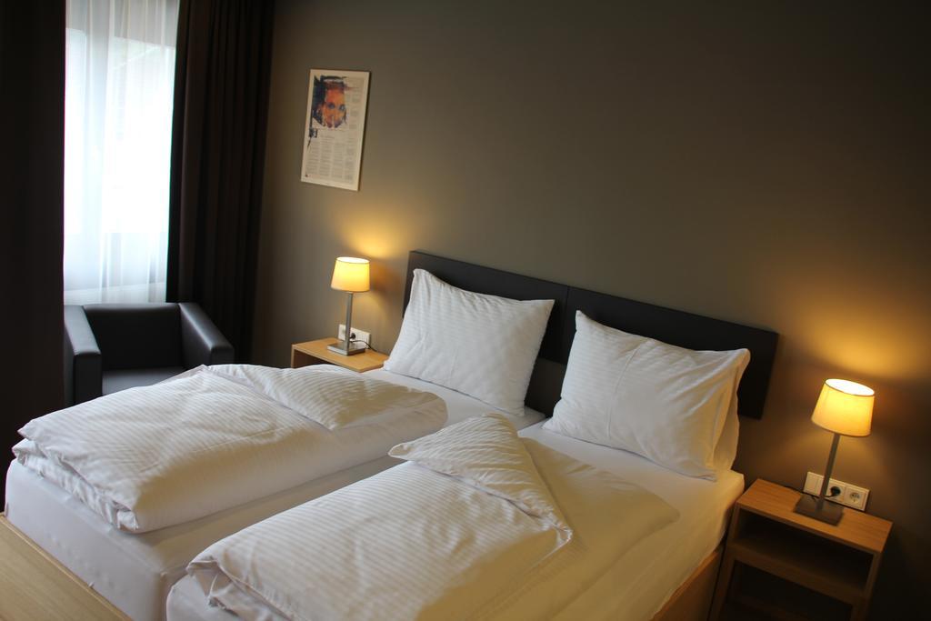Hotel Am Garnmarkt Гётцис Номер фото