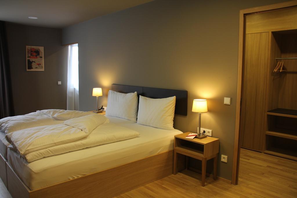 Hotel Am Garnmarkt Гётцис Номер фото